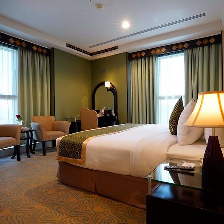 Awaliv International Hotel Ta'if Chambre photo A bedroom at the hotel