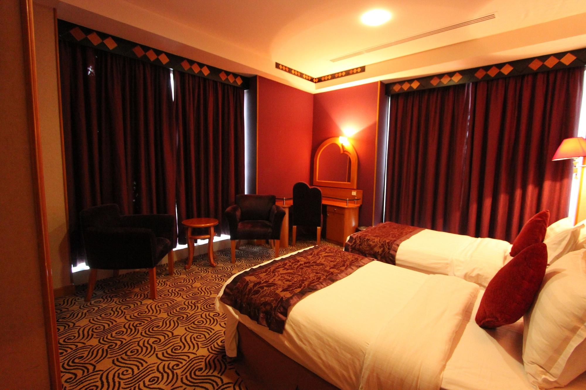 Awaliv International Hotel Ta'if Extérieur photo A room at the hotel