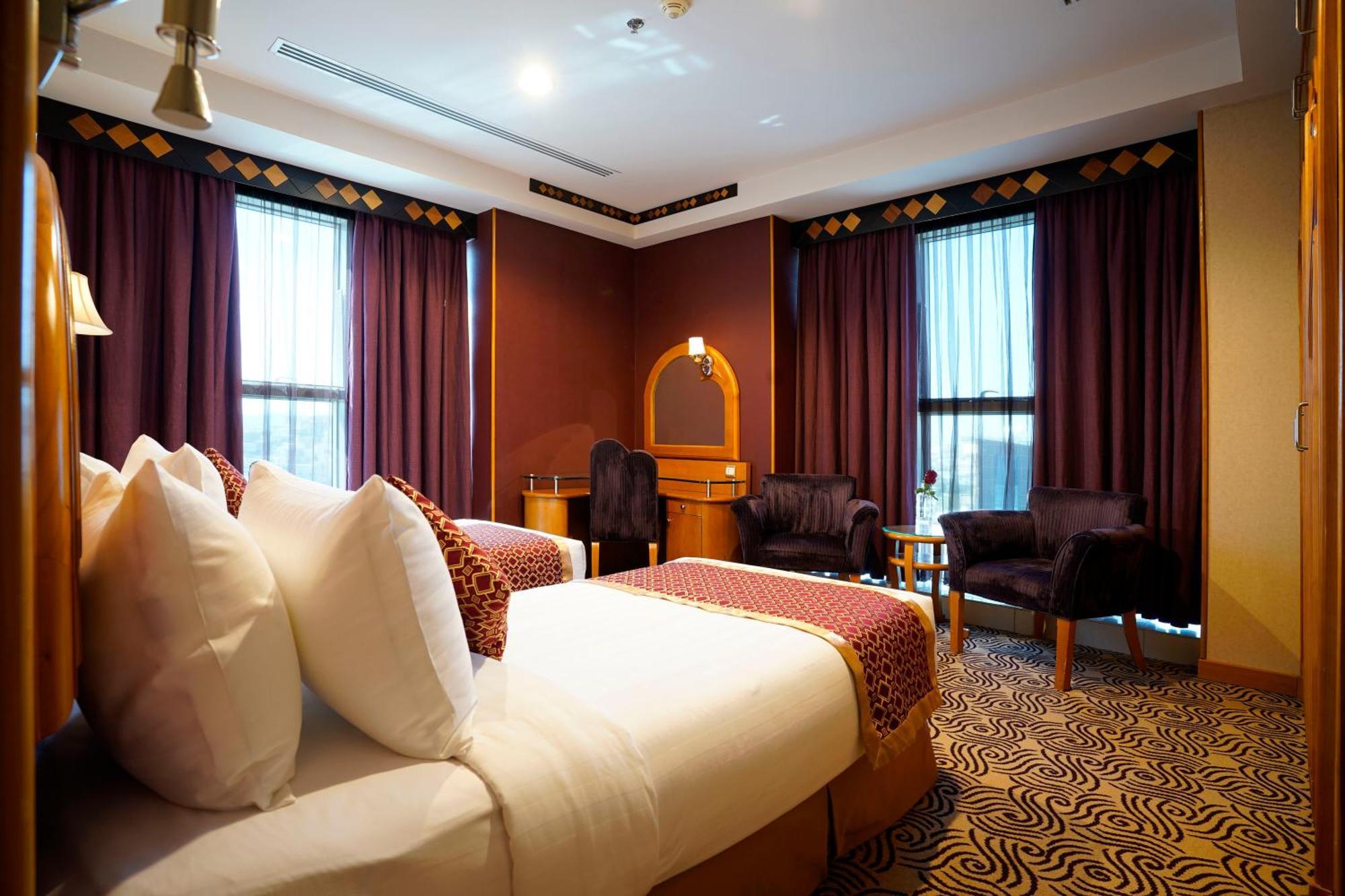 Awaliv International Hotel Ta'if Chambre photo A room at the hotel