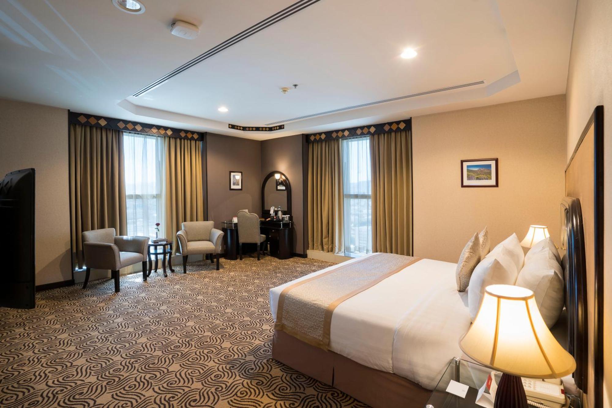 Awaliv International Hotel Ta'if Chambre photo A room at the hotel