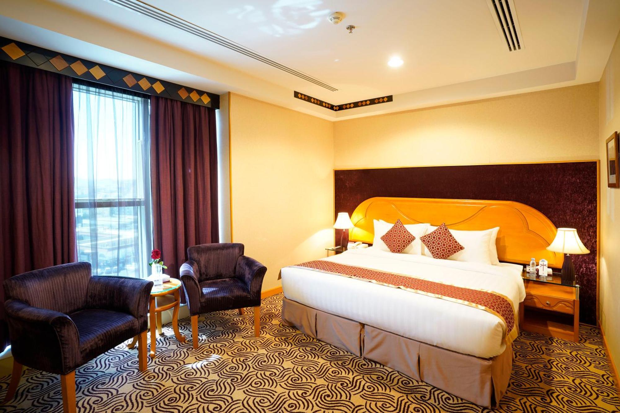 Awaliv International Hotel Ta'if Chambre photo A room at the hotel