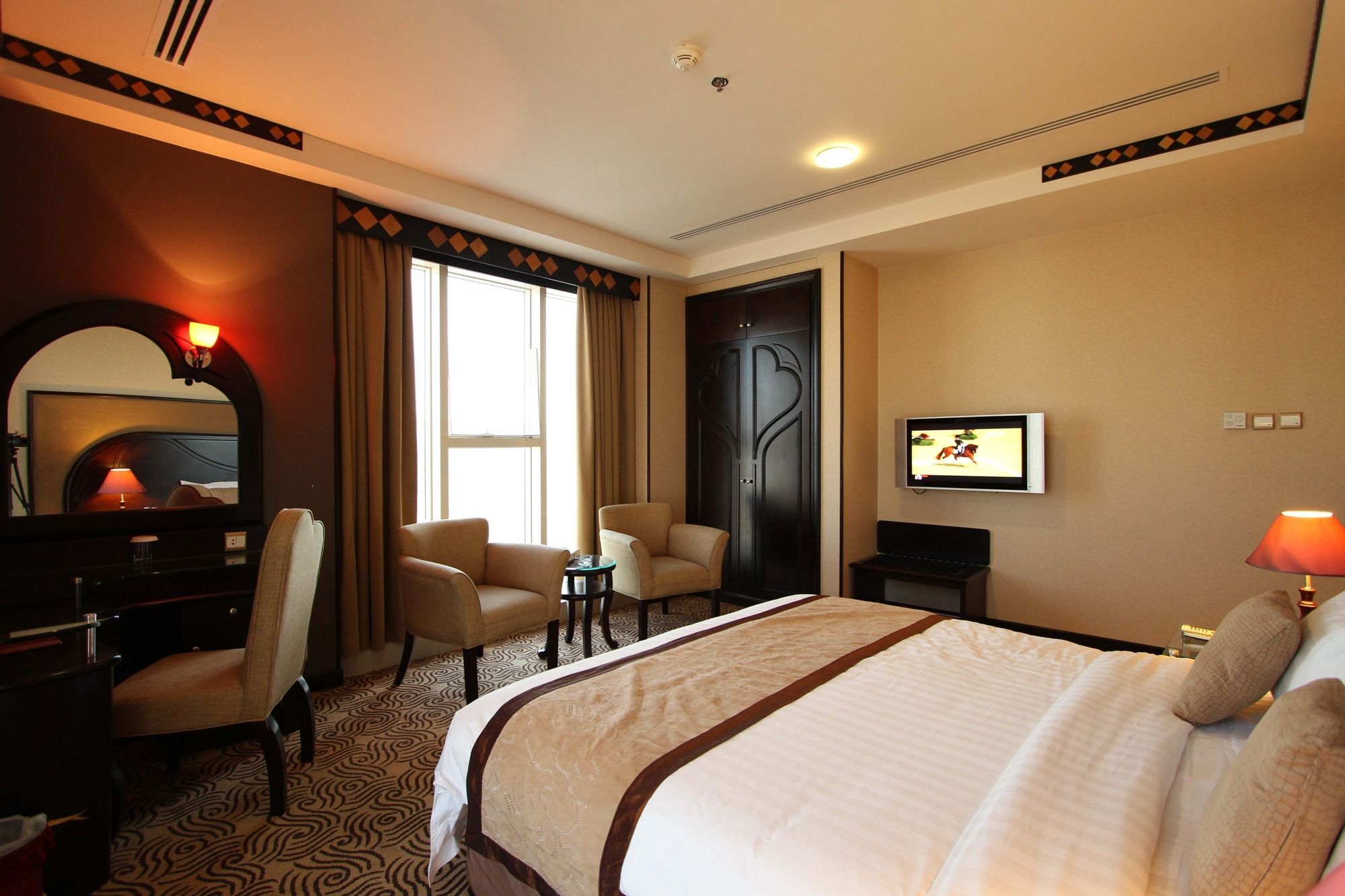 Awaliv International Hotel Ta'if Extérieur photo A room at the hotel